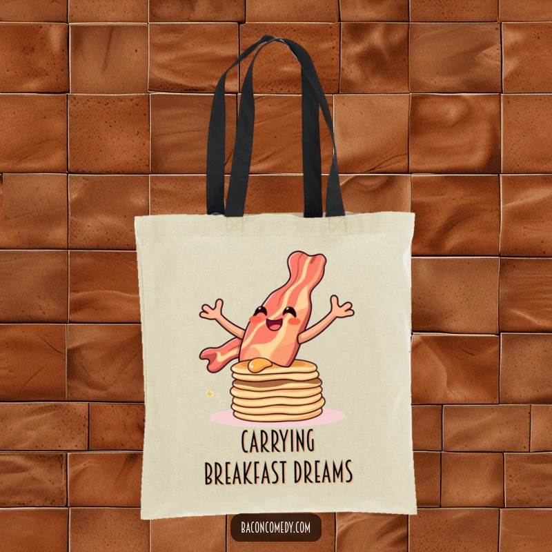 Funny tote bag showing a bacon strip performing an impressive leap over a stack of pancakes, full of glee.